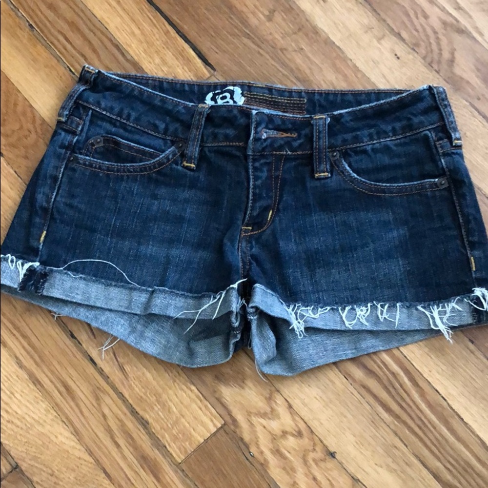 Distressed denim shorts